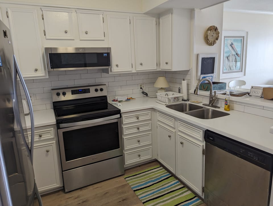 New counter, backsplash, flooring and sink/faucets 2024