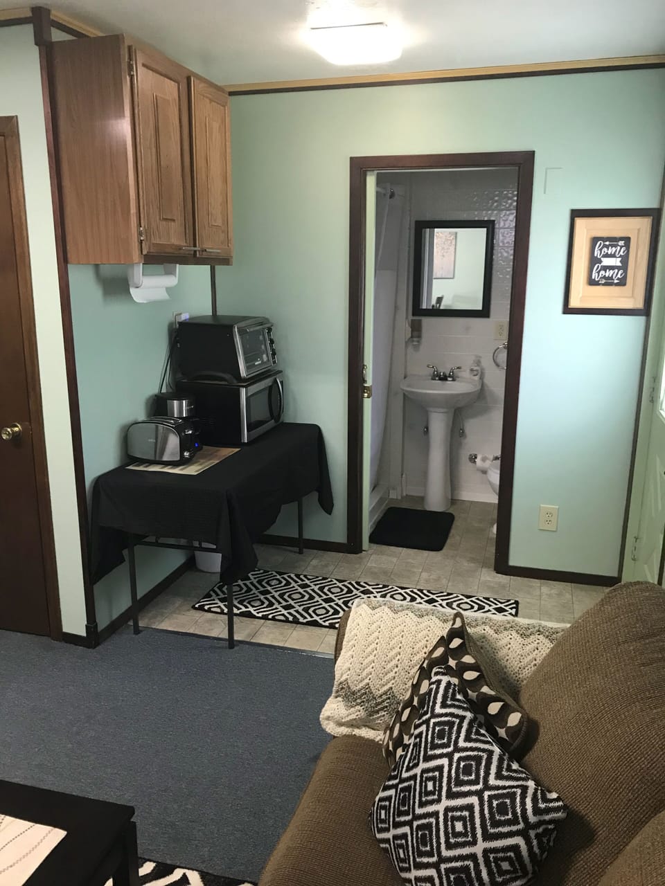 We provide a microwave, little oven, toaster, and coffee pot.