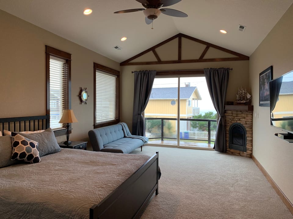 Fireplace, Balcony in Main Floor Master Bedroom