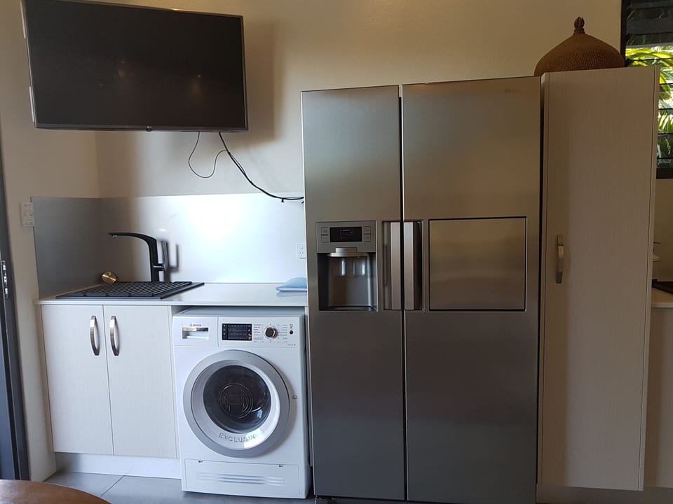 laundrette and fridge with icemaker