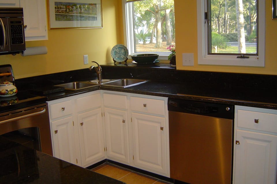 Newly renovated kitchen with granite and stainless steel appliances