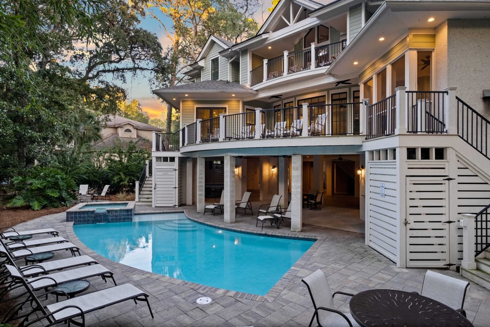 Back of the house. Pool and spa (heated for a fee).