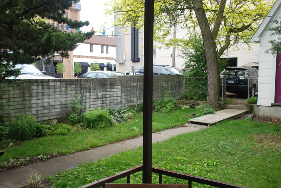 Bedrooms overlook this serene backyard.  What a find in the middle of downtown!