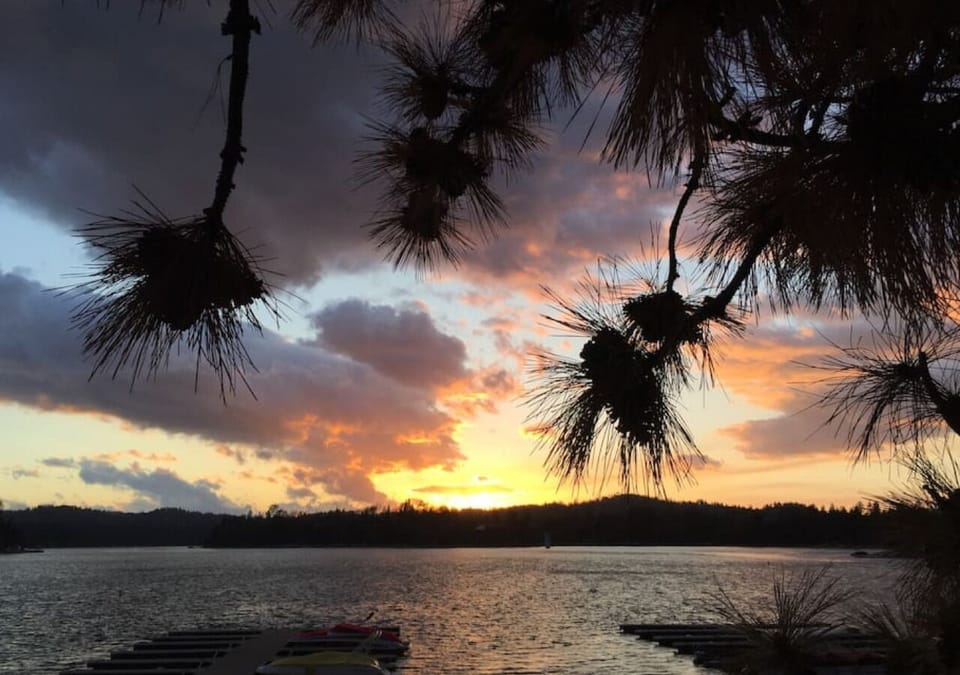 Lake Arrowhead sunset - although there is no direct lake access there are beautiful views of it from the Village waterfront with Queen boat tours available.