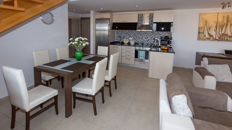 Large open plan dining area, kitchen, living room and hall