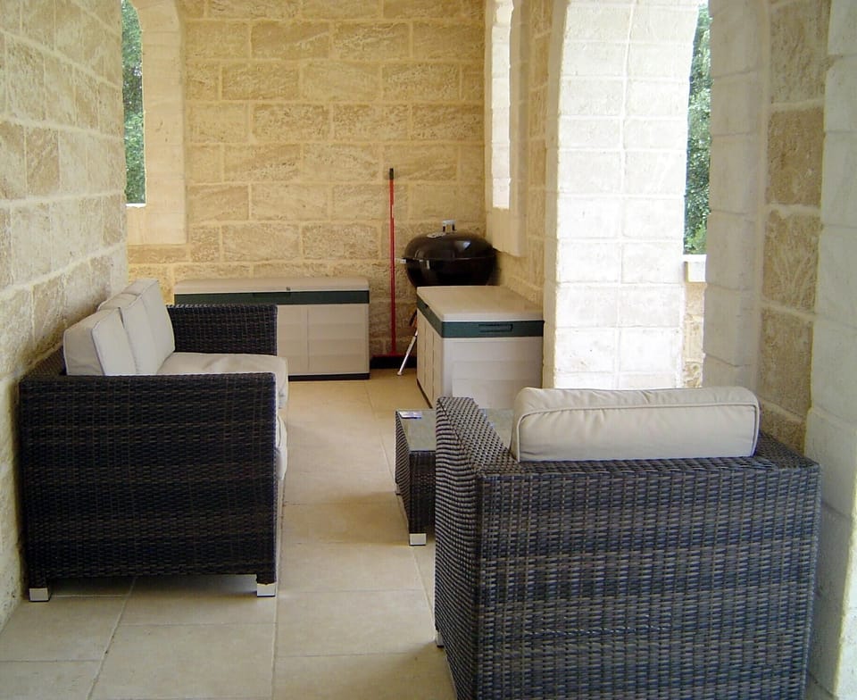 The villa terrace with comfortable seating.