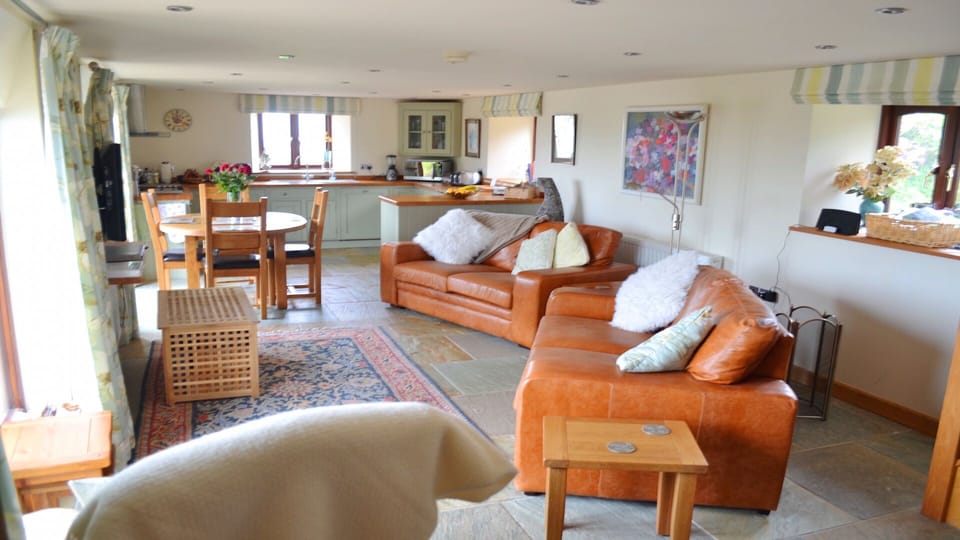 quality contemporary furnishings throughout, natural slate floors 