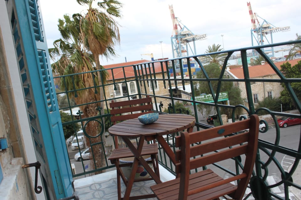 Relaxing terrace with Mediterranean sea and Baha'i Gardens view