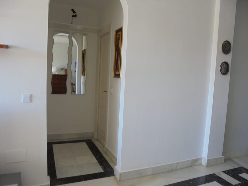 Hall to bedroom and bathroom