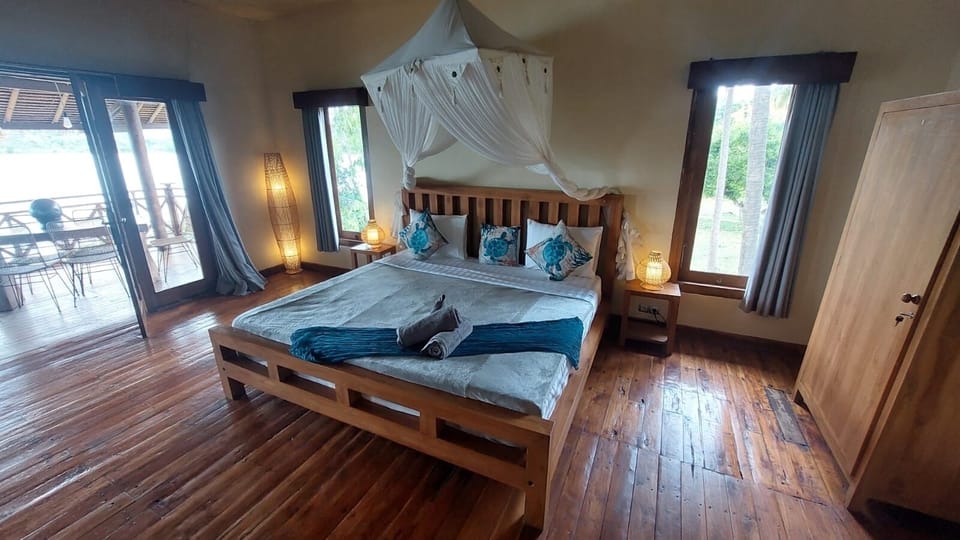 The Master Bedroom opening onto the spacious verandah.
