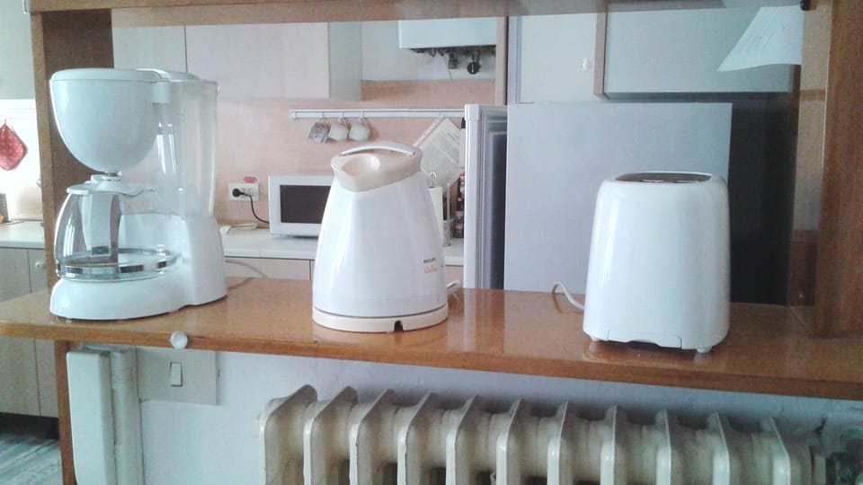open plan kitchen dining area, toaster kettle and filter coffee