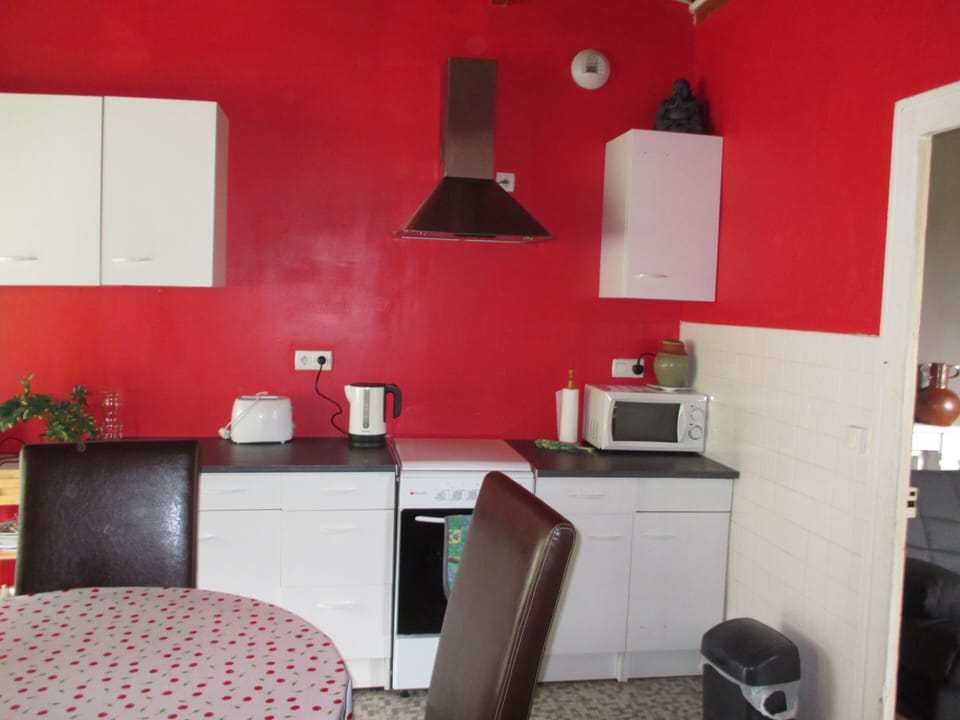 Kitchen with new cooker, Microwave, Toaster, Kettle etc.