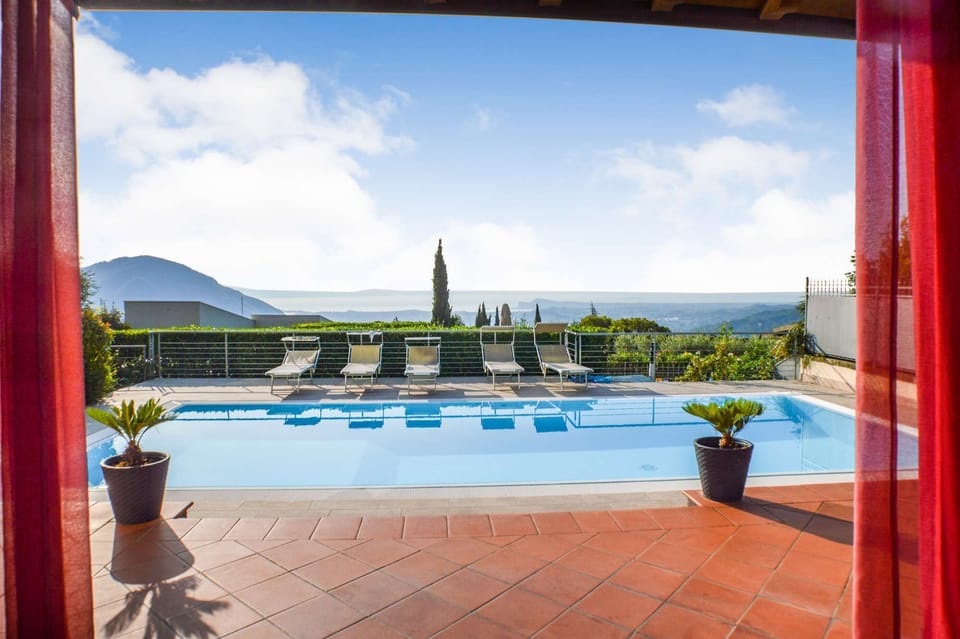 View over pool from the portico, lovely shaded area in summer