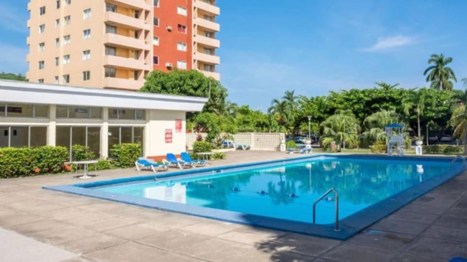 Enjoy access to the large shared swimming pool within the secure complex.