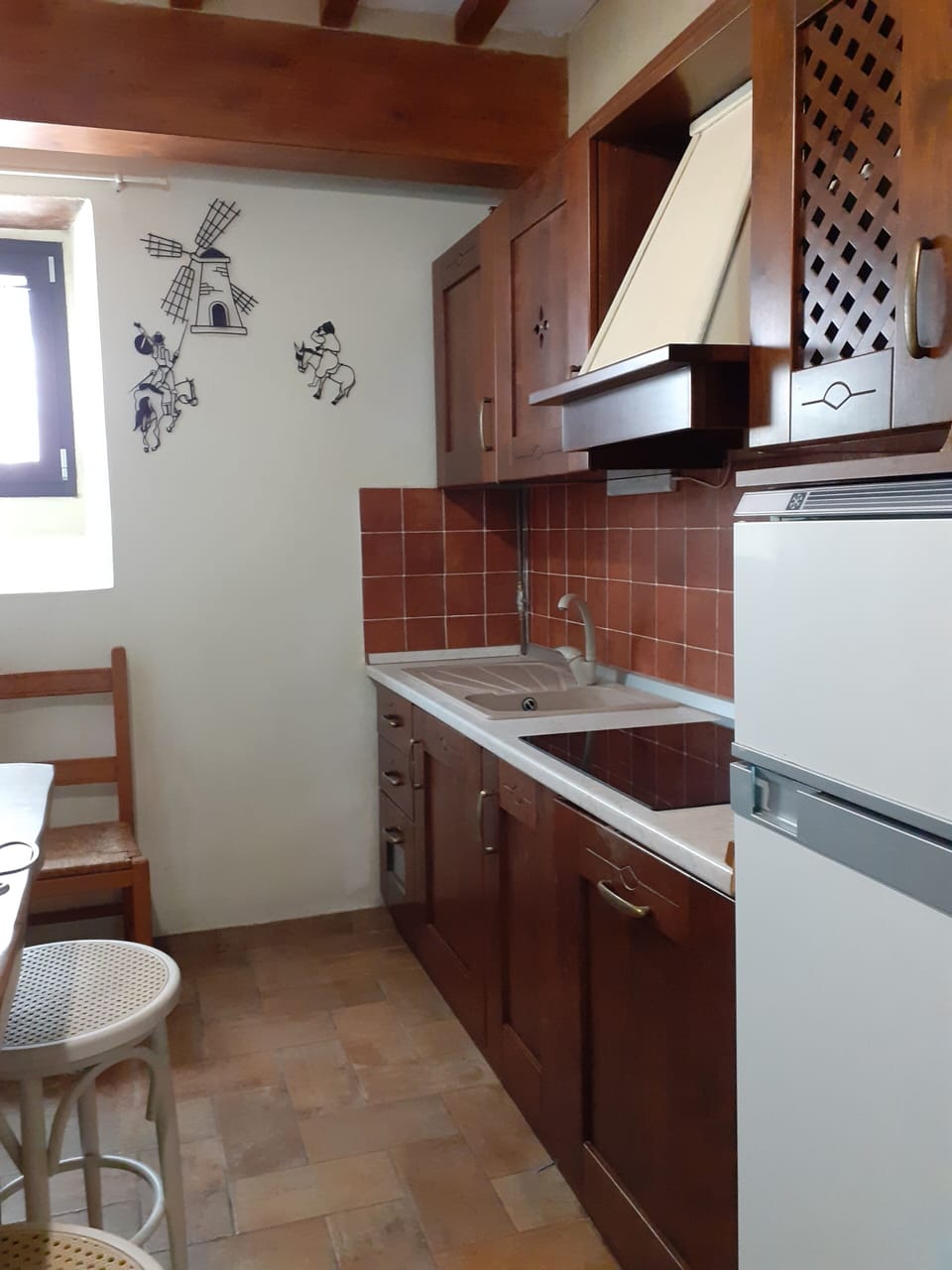 the modern and the well-equipped kitchen with microwave oven, kettle, bread warm