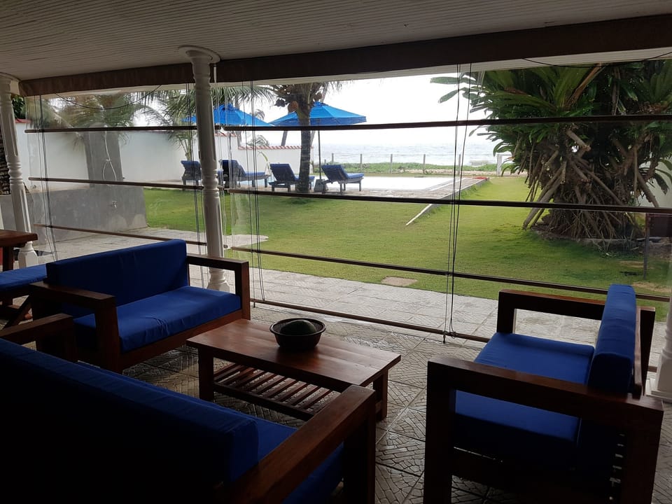 Monsoon blinds down under the veranda