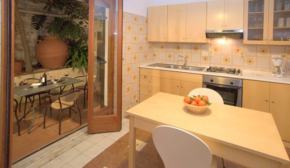KITCHEN FULL EQUIPPED WITH DISHWASHER AND WASHING MACHINE
