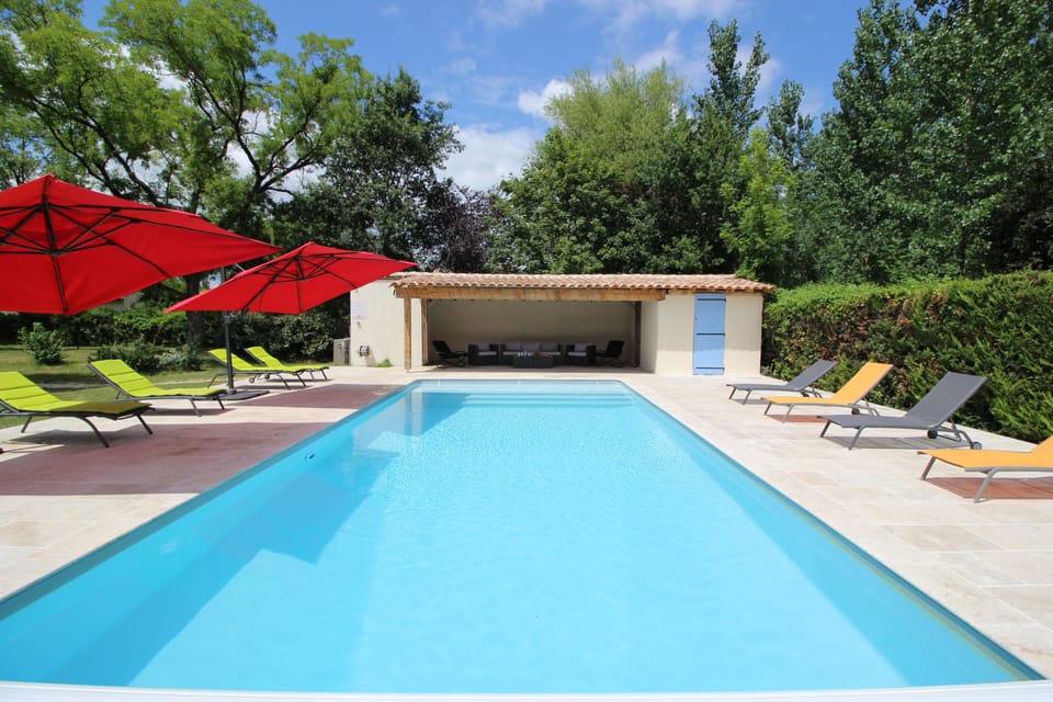 Spacious terrace to relax by the heated pool - covered seating in the pool house