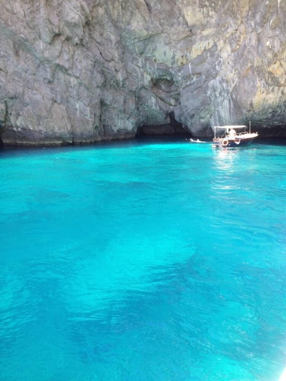 Tourist photo  Capri   green grot