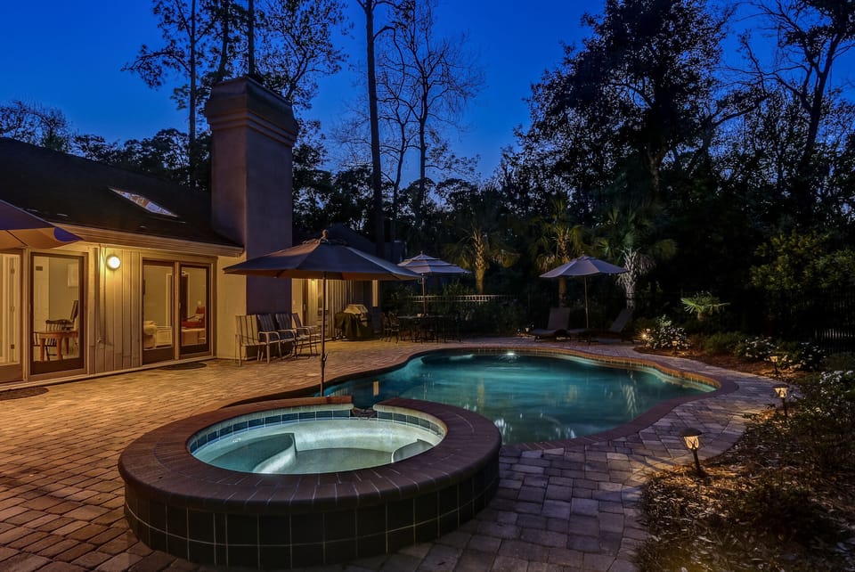 Private swimming pool at night.