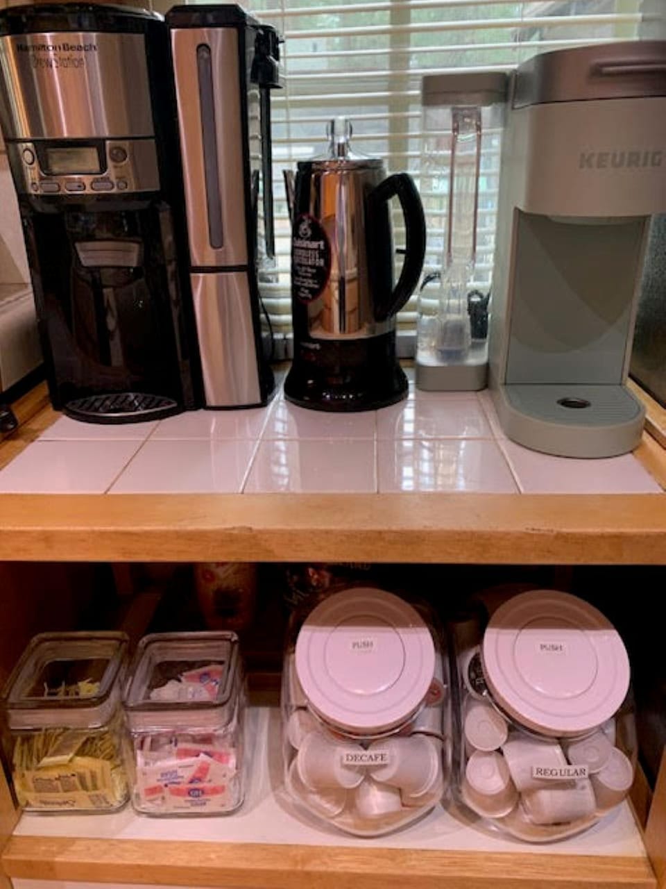One Keurig, One 12-Cup,  Electric Hot Water Kettle.  Coffee, creamer & sugar 