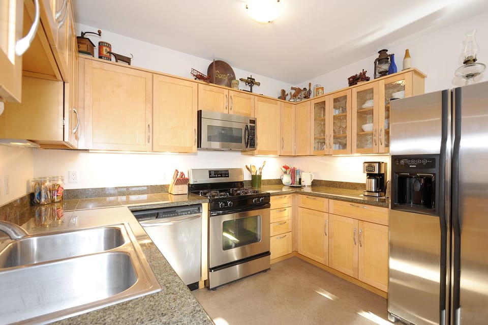 Full kitchen stocked with the basics