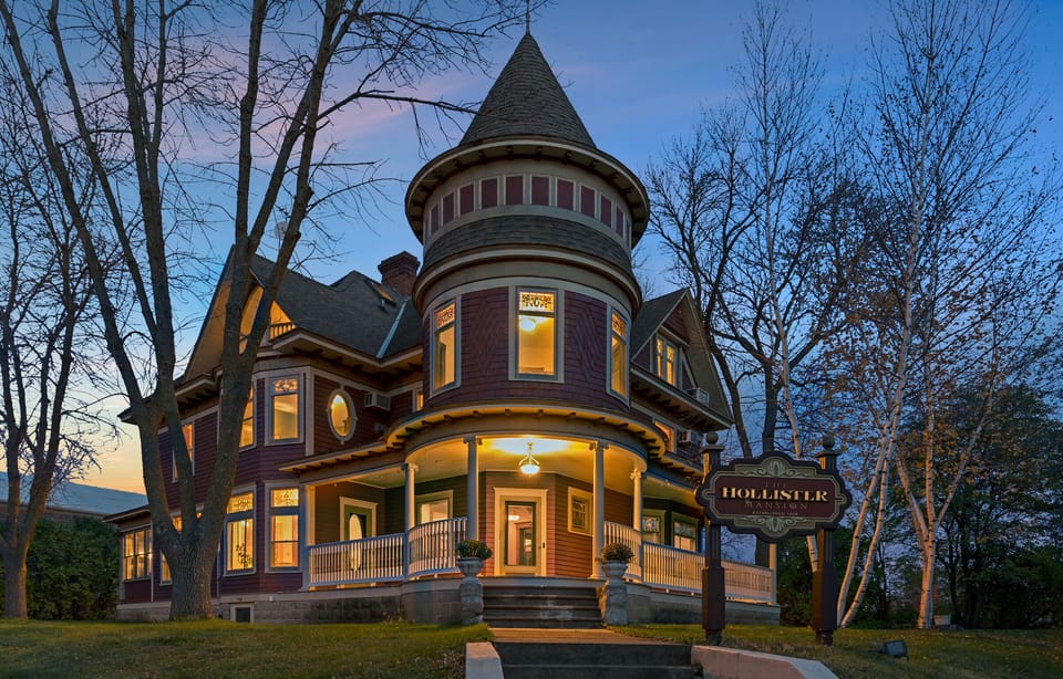 Queen Anne Victorian Mansion featuring wrap-around porch and regal entrance