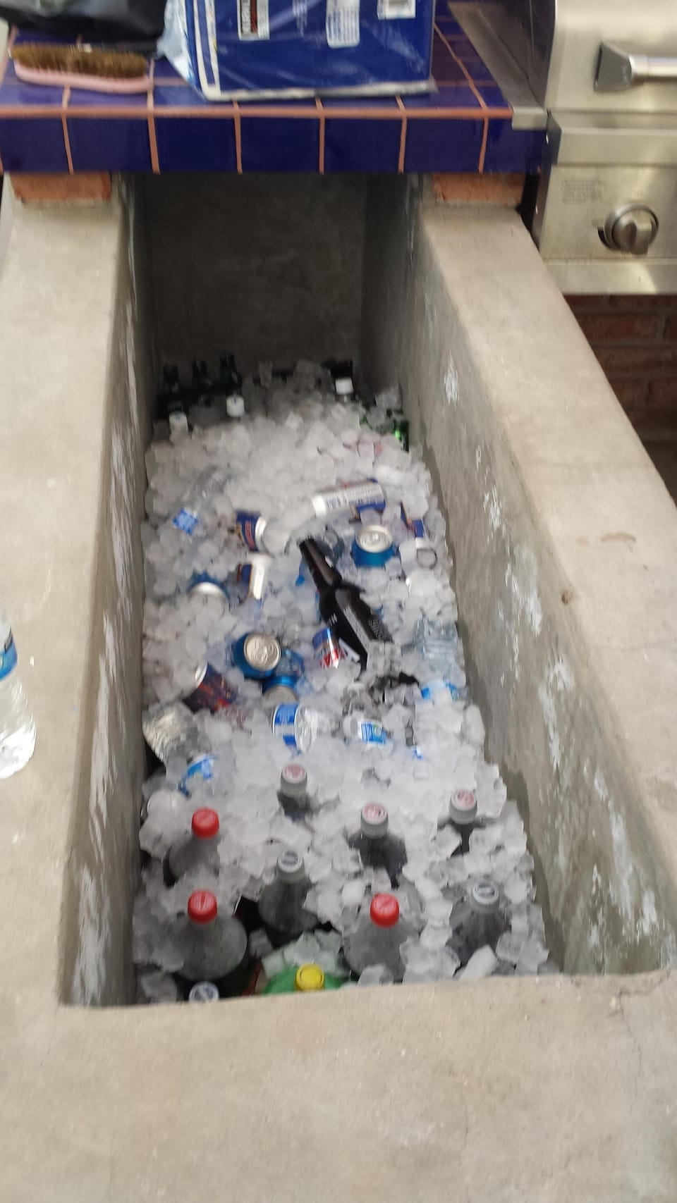 Built in Ice chest to BBQ, will hold all your beverages.