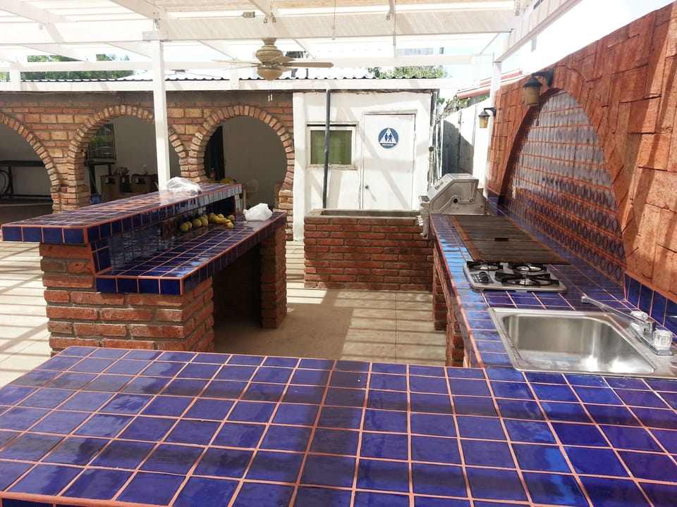 5 burner drop in grill, 6 foot charcoal grill, stove. sink and island bar