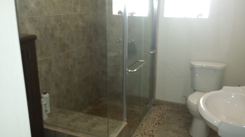 Modern bathrooms. 2compleate baths in house, 6 additional in patio area...