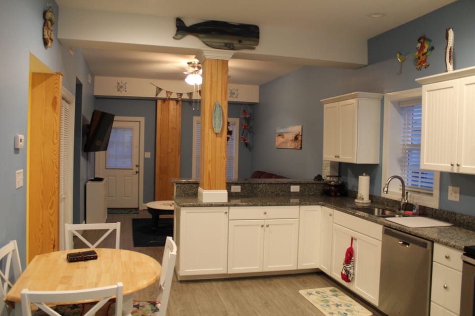 Kitchen opens up into den.
