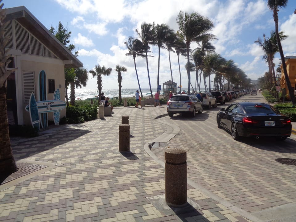 Entrance to the Deerfield beach pier and Ocean. 3/4 mile of beautiful palm trees