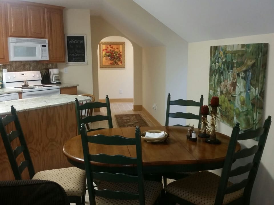 Kitchen and eating area.  Apartment sleeps six, 3 beds and 2 futons.
