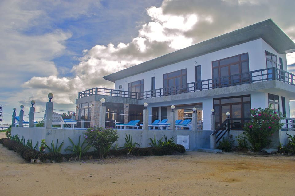 Private Pool, Sundeck over viewing the water and San Pedro Town.