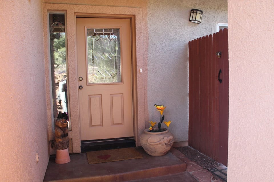 Your Entrance is the Gate to the Right of Front Door