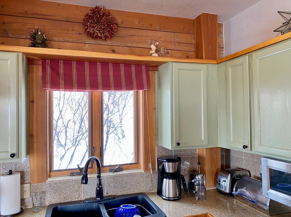 Full kitchen includes coffee, press pot, toaster, microwave, refrigerator, stove
