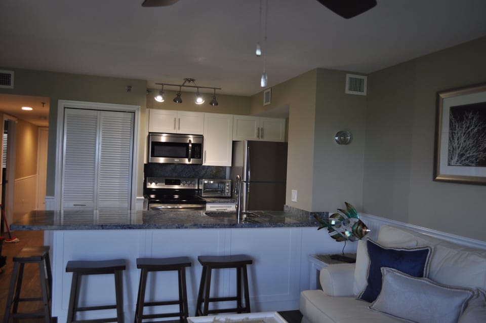 Kitchen with large Blue Bahia Counter