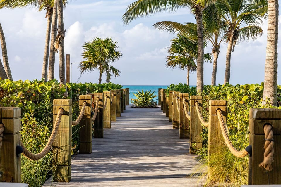 Boardwalk to Beach on the pool level of Residence - Suite 302 Vacation Rental