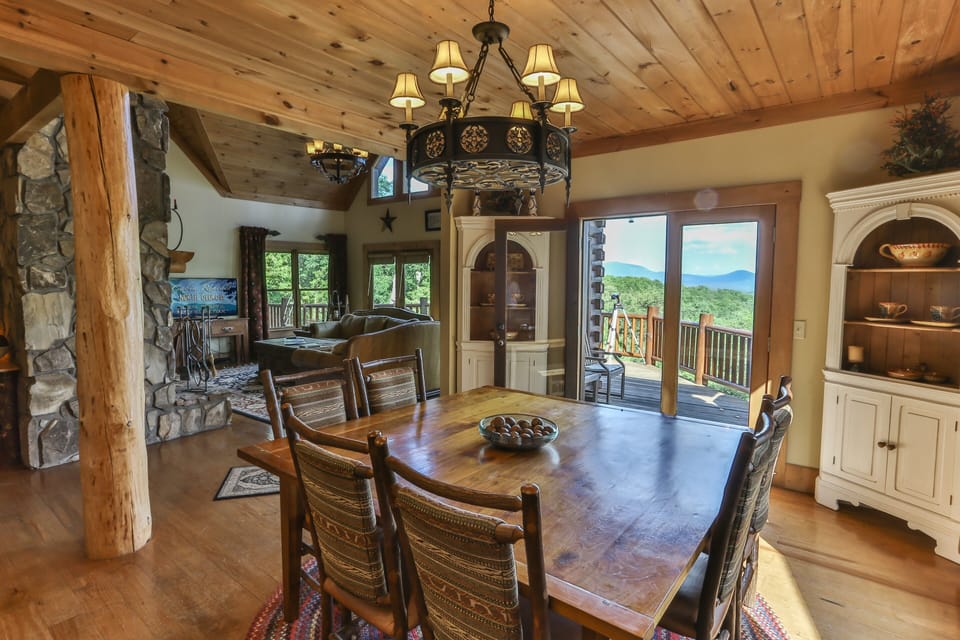 Open concept joining kitchen, dinning, and great room areas
