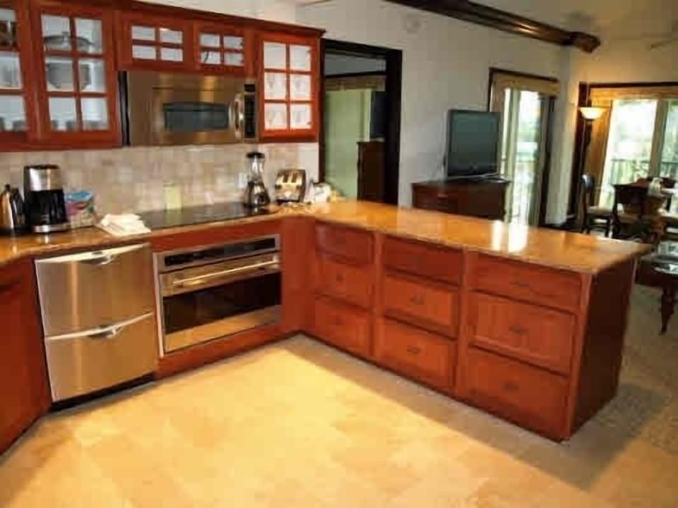 Open Kitchen w/granite counters and stone floors...a Chef's delight!!!