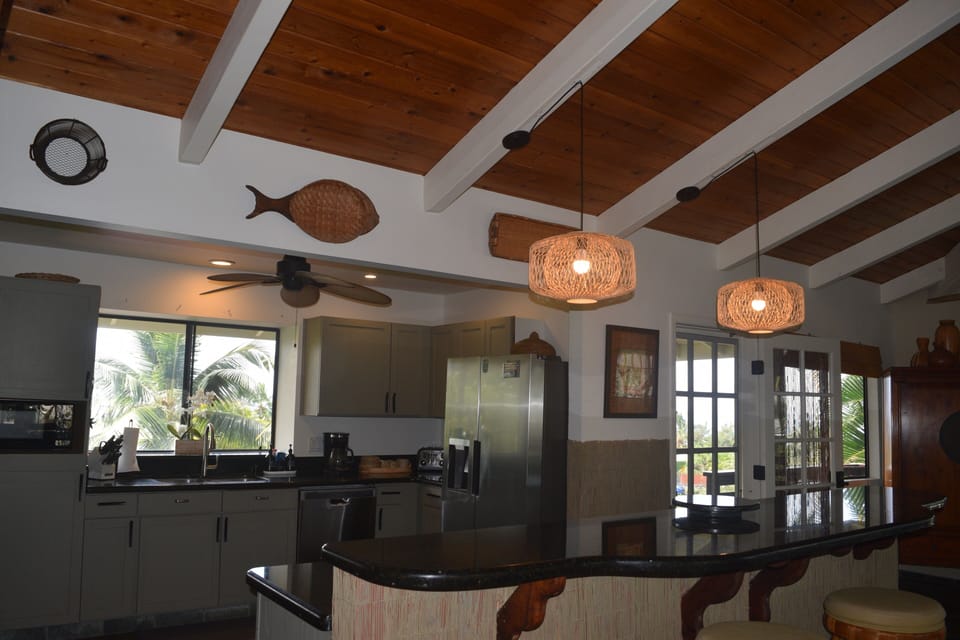 Fully equipped kitchen with six burner gas stove & double oven.