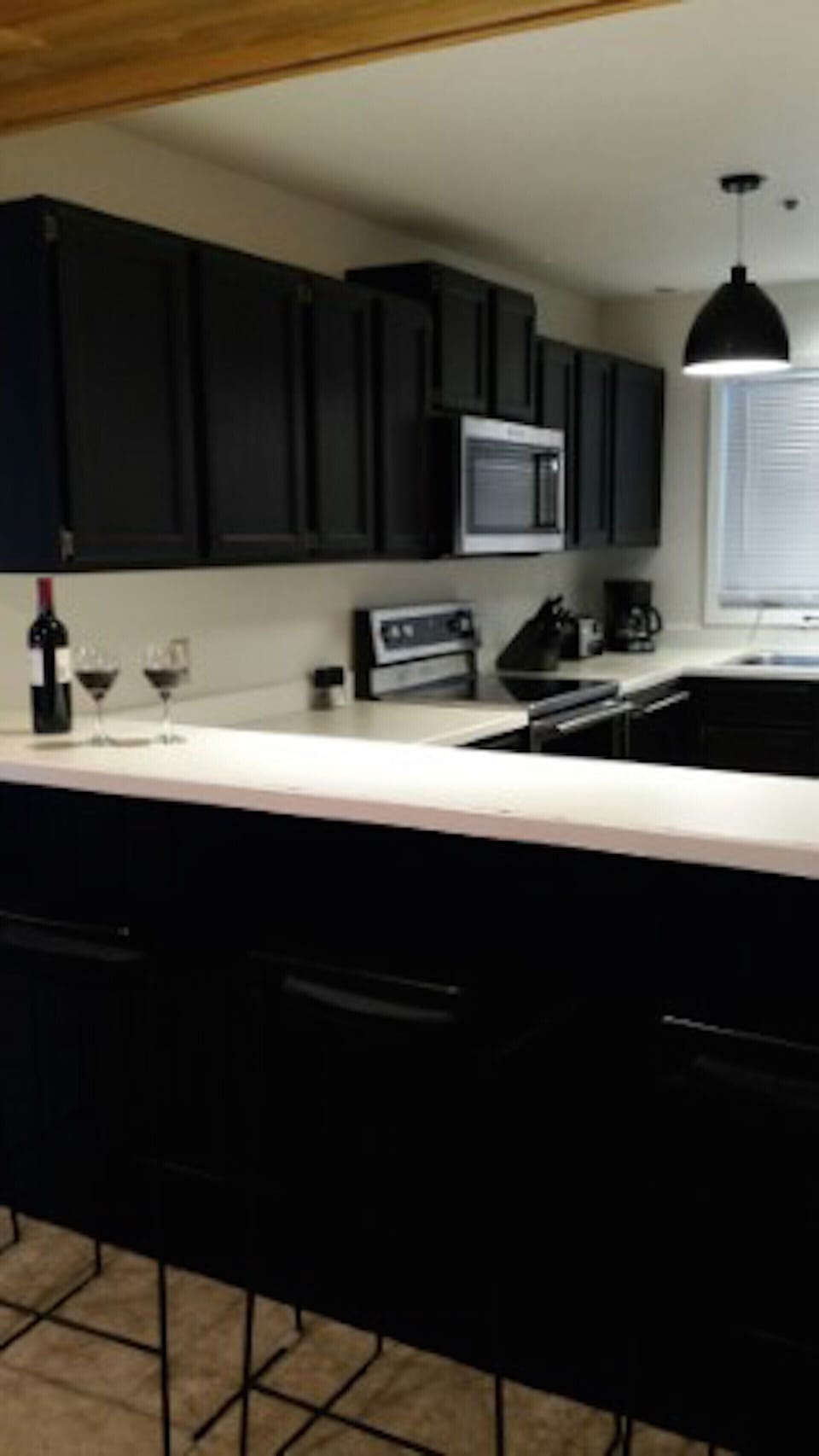 All new stainless appliances in the full kitchen with breakfast bar