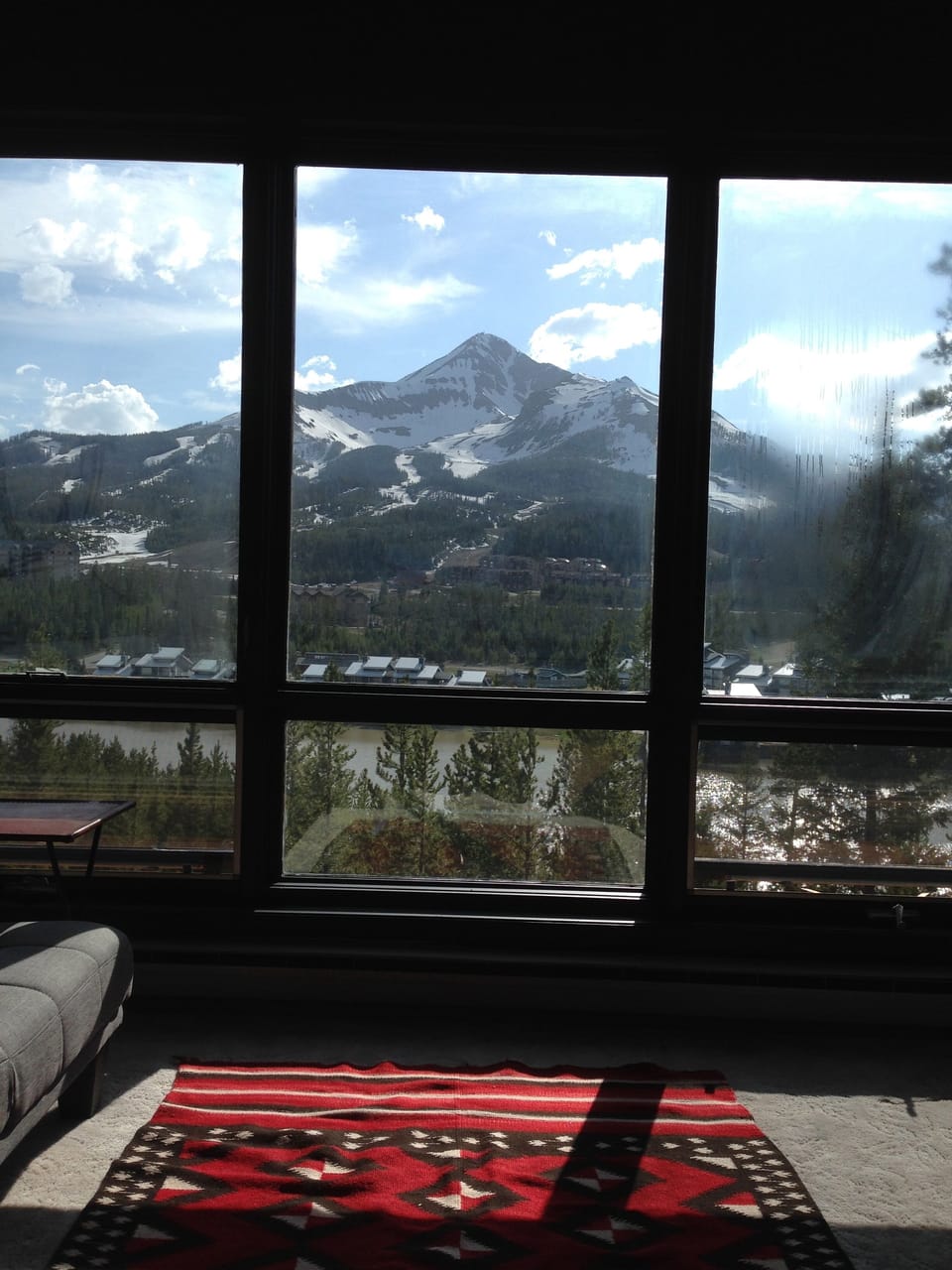 View from sunroom; Lone Peak, Big Sky Resort area and Lake Lewinsky, Spring.