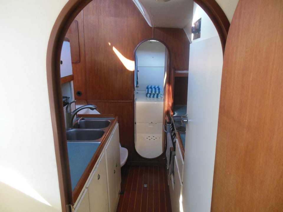 From stateroom thru galley to head. 