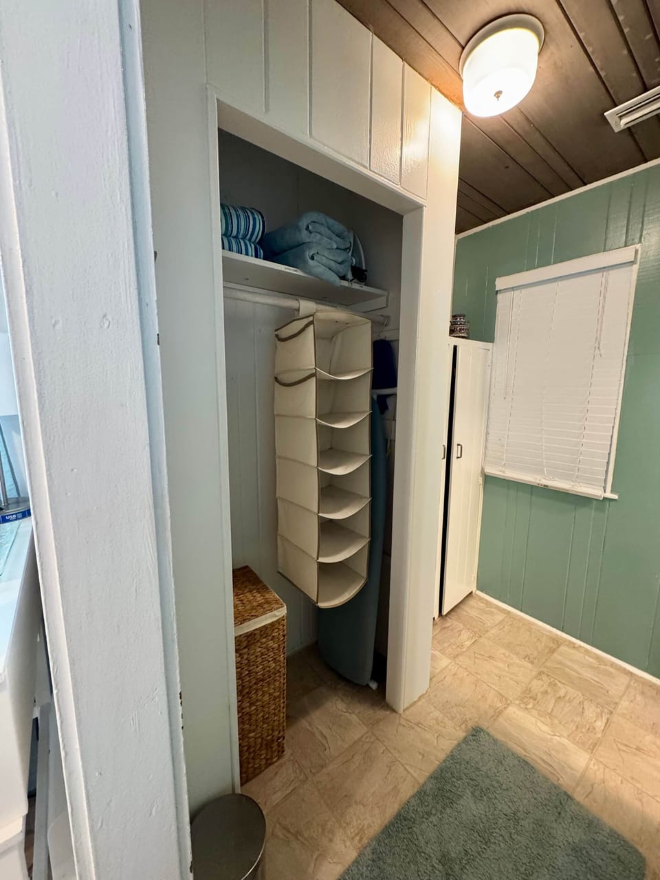 Area from bedroom to bathroom with closet