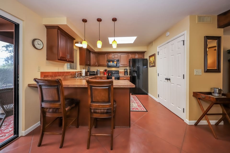View from the dining area into the kitchen.