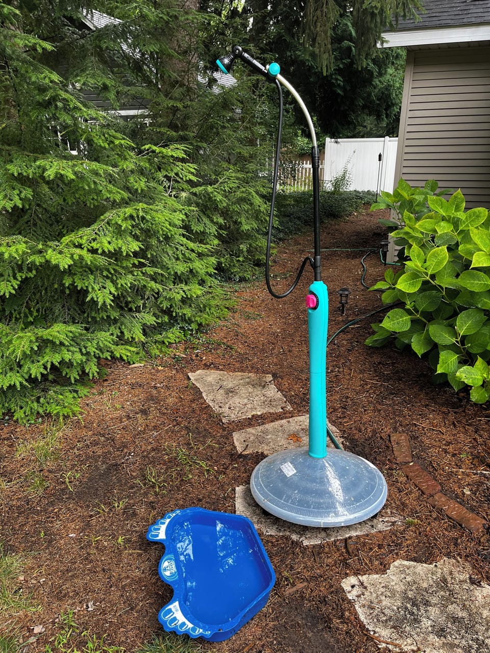 Out door shower that has a heated base