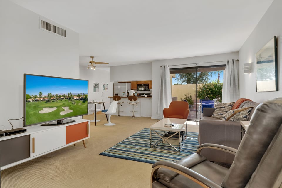 Bright living room 
Sliders leading to relaxing Private patio