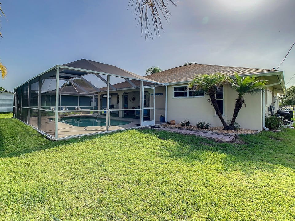 Rear garden and lanai view