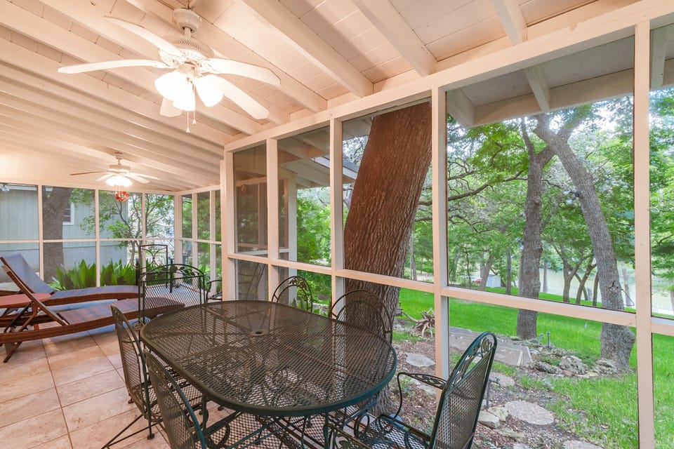 Screened in patio with a clear river view 